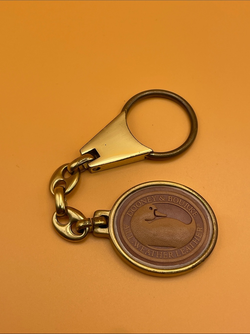 Dooney & Bourke Brass & Light Brown Leather Duck Logo Key Ring Purse Charm